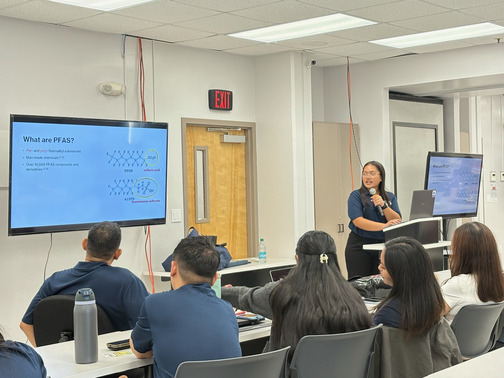 Claire Marzan, WERI RA, displays the structure of PFAS molecules. Photo by WERI.