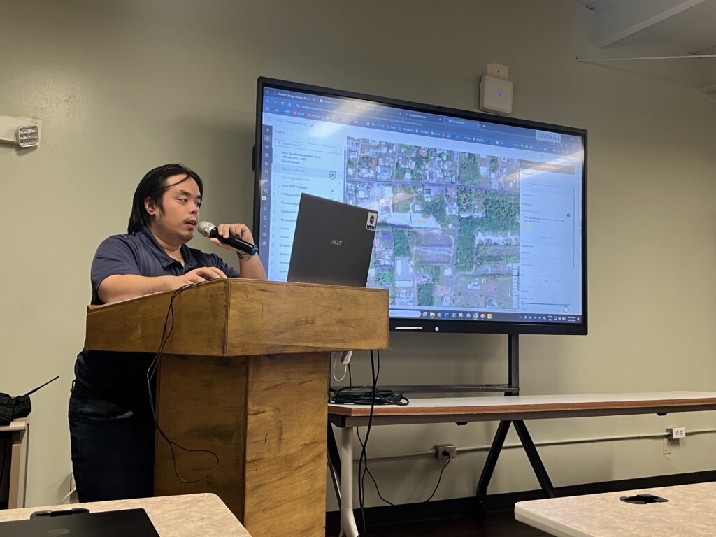Mr. Pangelinan presenting a Geodatabase.